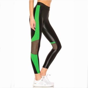 Koral 7/8 leggings with mesh/net detail, size Medium in great condition!